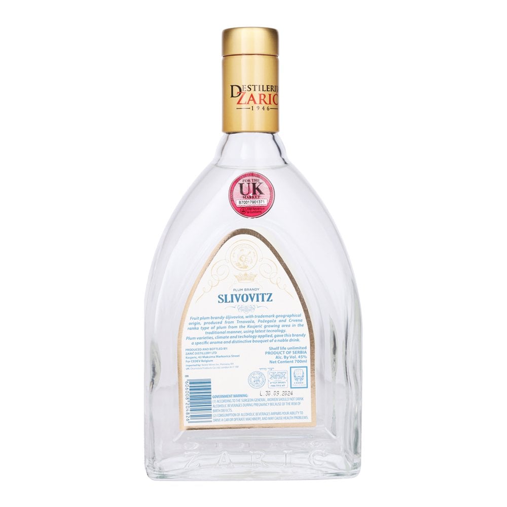 Back of bottle of plum brandy Slivovitz with gold cap